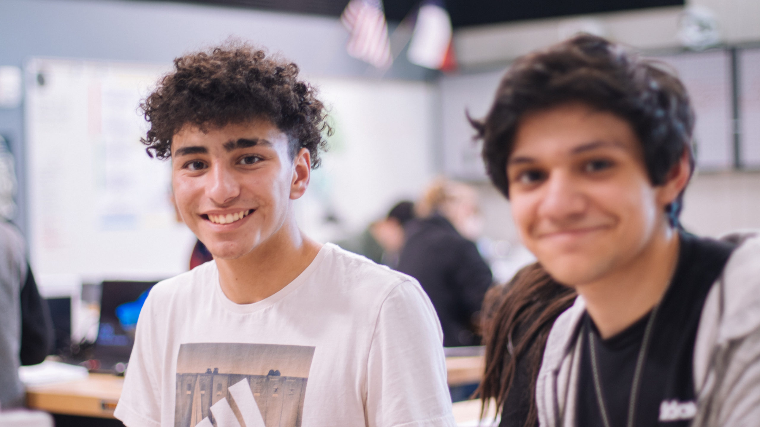 Two young men in a classroom