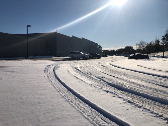 Snow-covered area outside building in Texas