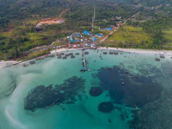 Tanjung Pinang Fishing village along Bintan coastal line aerial view, Indonesia