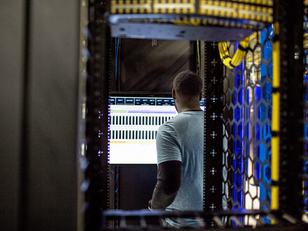 A man working in a datacenter