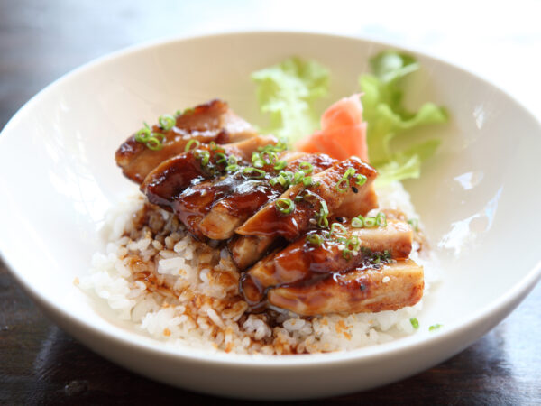 Soy sauce over chicken and rice