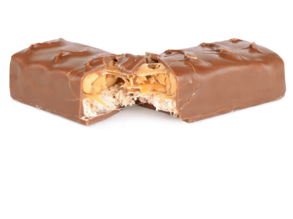 A chocolate bar filled with nuts, caramel, and nougat