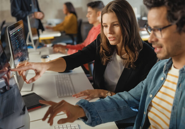 College students working together on technological innovations