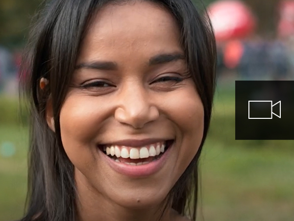 A young woman smiling