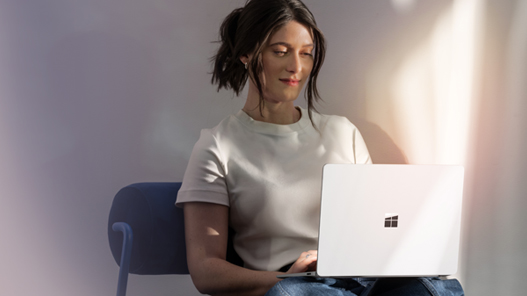 A young woman starting a business on her laptop