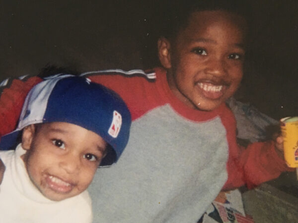 Naim Jones, as a young child, with his sibling