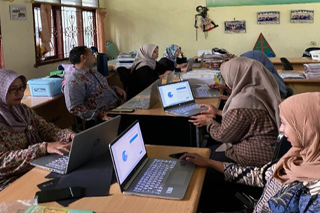 An Indonesian classroom with students and a teacher