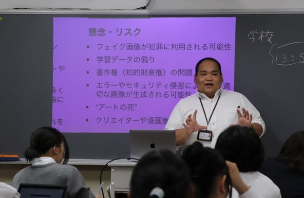 Takata explaining the risks of generative AI to his students at Izuo Technical High School, highlighting concerns such as data bias and copyright infringement.