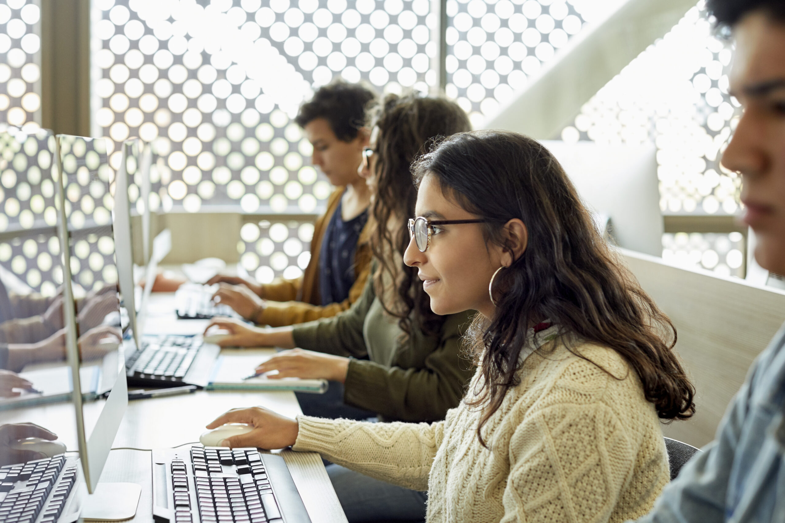 Teens in Spain working on computers
